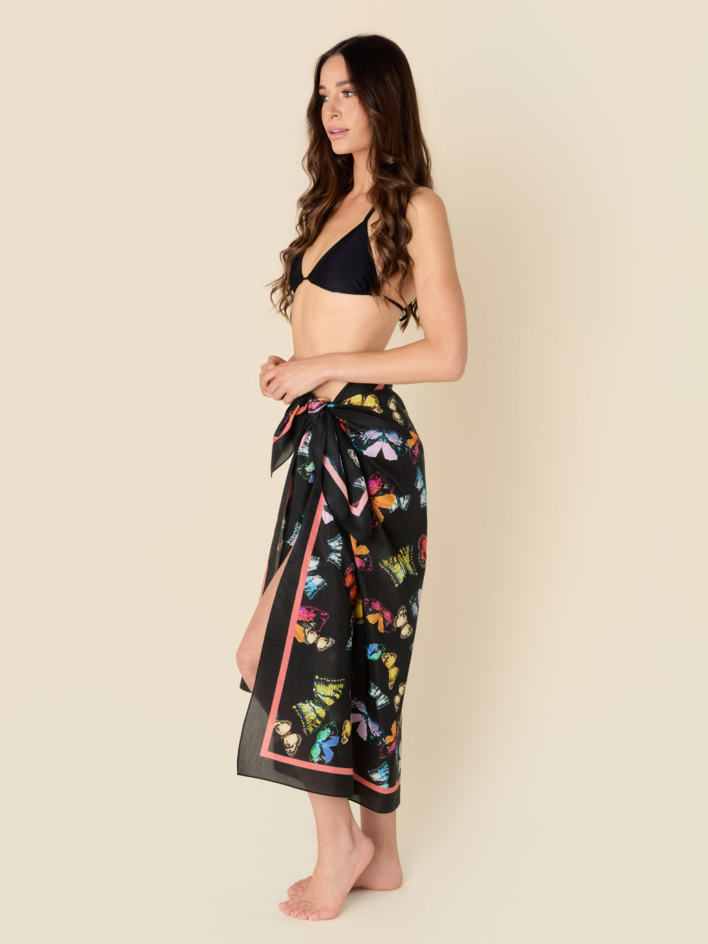 Whisperwing Black black pareo cover-up with watercolor butterfly details, made from a lightweight cotton-silk blend by GEM Beach Collection.
