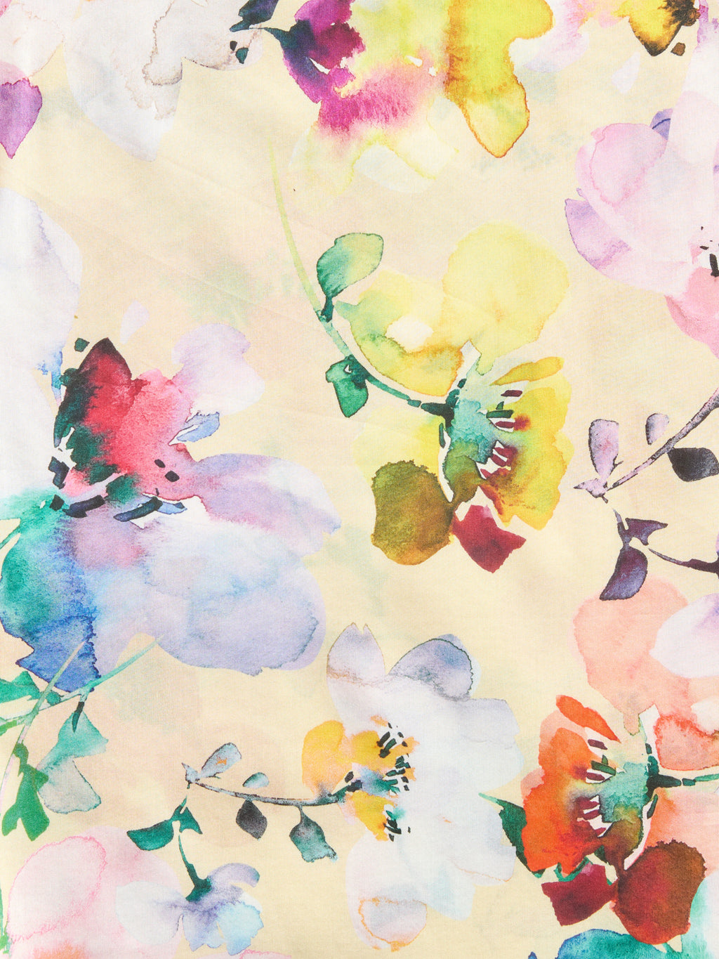 Cotton-silk pareo cover-up with soft watercolor flowers on a sun-kissed golden ground by GEM Beach Collection.