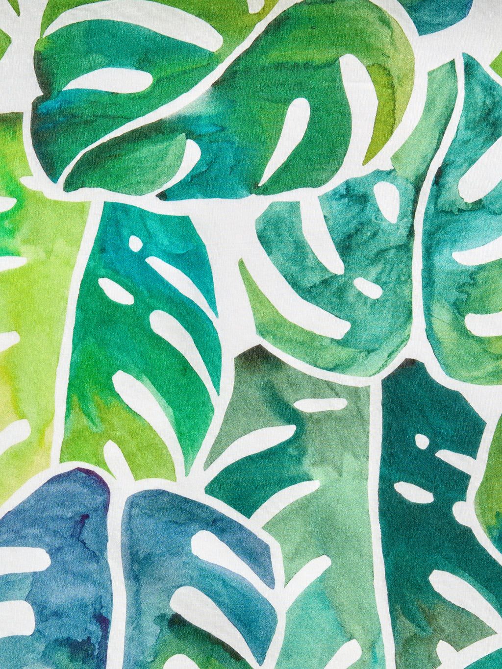 Emerald Shore cotton-silk pareo beach wrap by GEM Beach Collection, featuring rich greens and blues in a coastal-inspired print.