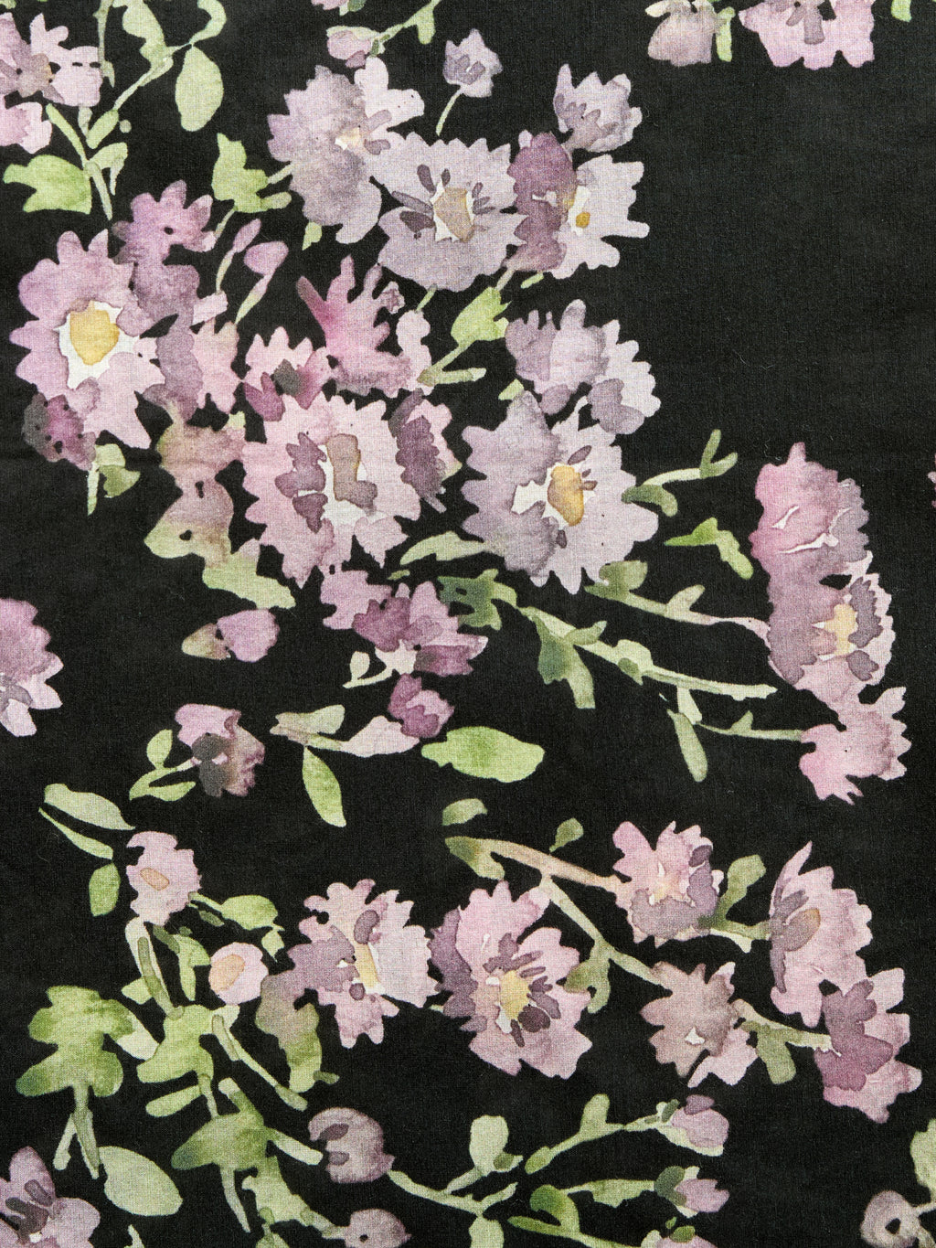 Petit Midnight black pareo cover-up with purple flowers, made from a lightweight cotton-silk blend by GEM Beach Collection.