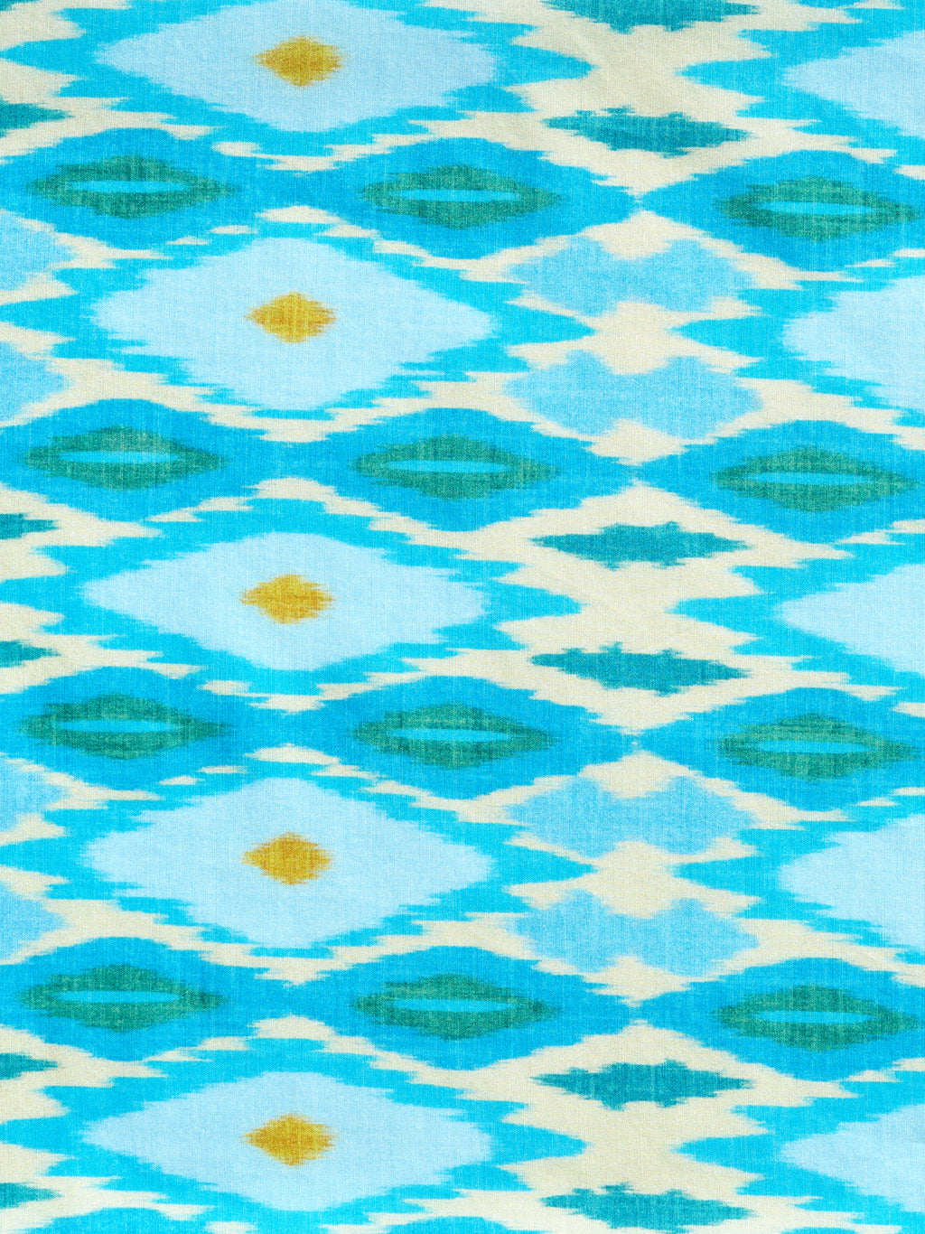 Blue geometric pareo cover-up with ocean blue and soft gold tones, made from a lightweight cotton-silk blend by GEM Beach Collection.